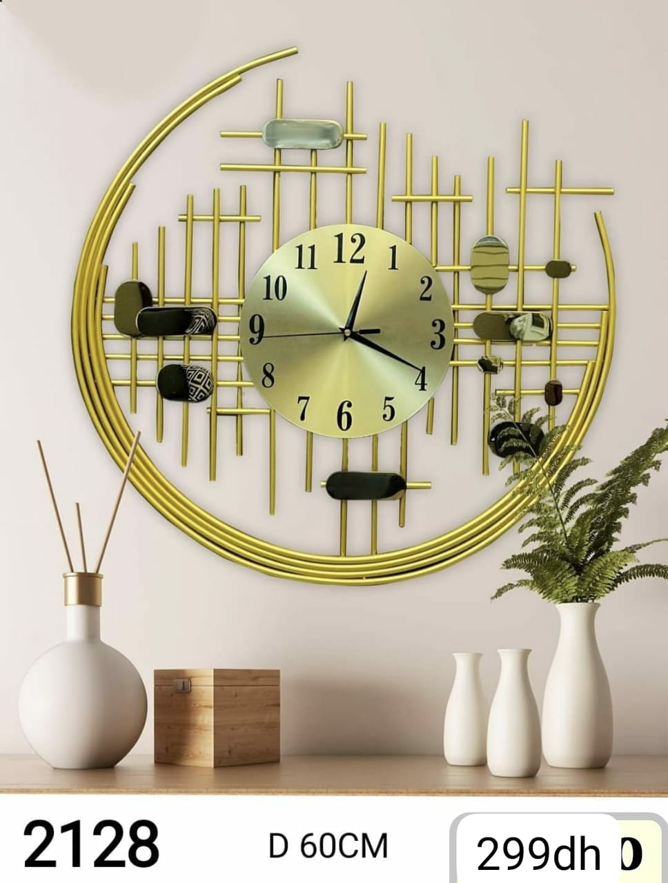 ساعة حائط عصرية بتصميم ذهبي أنيق